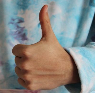 A person giving a thumbs up