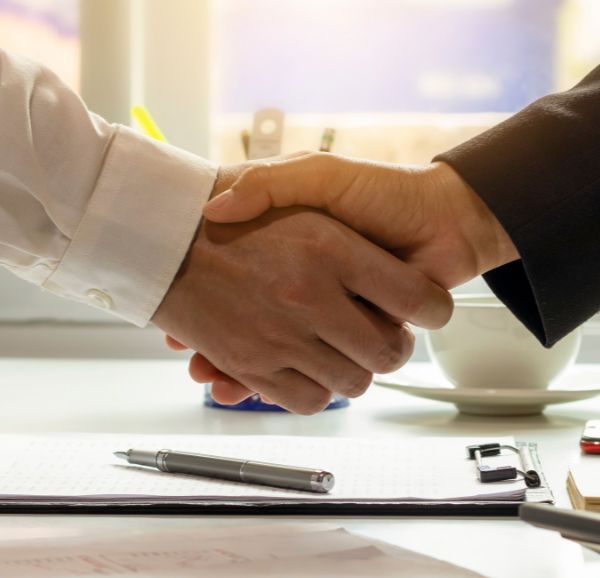 Two people shaking hands